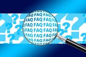 magnifying glass with faq words